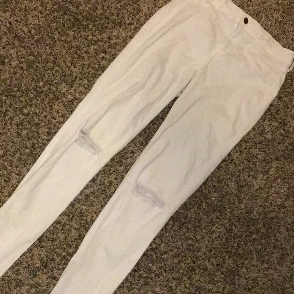 Rip at the knee white fashion nova jeans